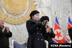 Kim Ju-ae în timpul paradei militare de la Phenian, 8 februarie 2023.