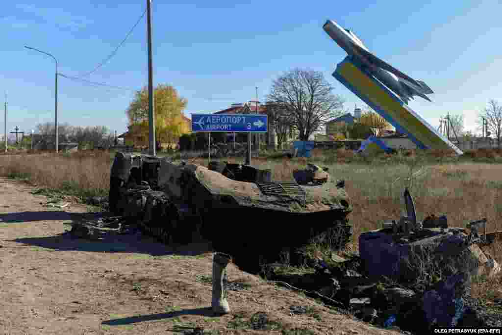 Destroyed Russian armor lies near the road to the Chornobaivka airfield near Kherson on November 15.&nbsp; Much of Kherson's infrastructure was&nbsp;destroyed&nbsp;during the eight months of Russian occupation.