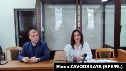 Председатель Абхазского народного движения Адгур Ардзинба и адвокат АНД Рамина Пасания 