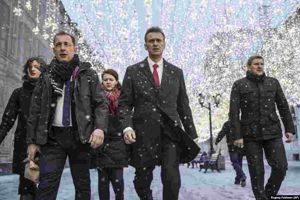 Navalny heads to Russia's Central Election Commission in Moscow on December 25, 2017. Navalny was disqualified from running due to his criminal conviction. The move was widely perceived as politically motivated.