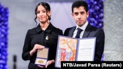 Kiana (left) and Ali Rahmani accepted the Nobel Peace Prize on behalf of their imprisoned mother in December 2023.