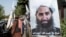 A poster of Taliban Supreme Leader Mullah Haibatullah Akhundzada is seen along a road in Kabul. (file photo)