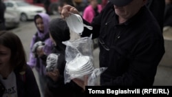 Respirator masks are distributed to the protesters.
