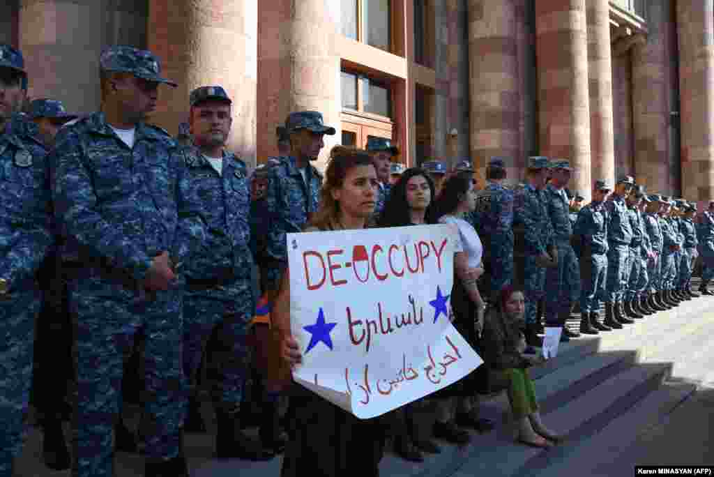 Armenians protest in central Yerevan on September 19 to urge the government to respond to the Azerbaijani military operation. After a brief but bloody six-week war between the regional archrivals in 2020, Azerbaijan recaptured much of Nagorno-Karabakh and seven surrounding districts controlled since the 1990s by ethnic Armenians with Yerevan's support.
