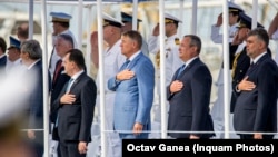 De la stânga la dreapta: Ludovic Orban - fost premier și președinte PNL, Klaus Iohannis - președintele României, Nicolae Ciucă - fost premier și actual președinte PNL și Marcel Ciolacu - premier și președintele PSD, la un eveniment de Ziua Marinei.