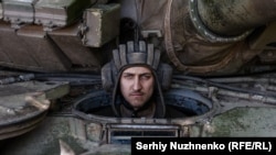 Украина: От күйгөн согуштун үч жылын көрсөткөн сүрөттөр 