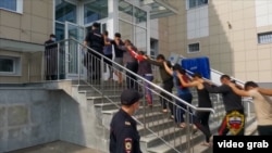 Боздошти муҳоҷирони корӣ дар Русия. Акс аз бойгонӣ