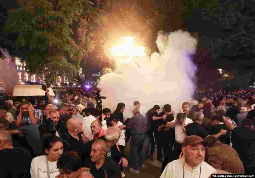 Angry crowds gathered outside government buildings in Yerevan late on September 19, calling for Pashinian to resign. &nbsp; 