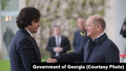 მარცხნიდან:საქართველოს პრემიერ-მინისტრი ირაკლი კობახიძე და გერმანიის კანცლერი ოლაფ შოლცი