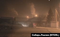 Smog from burning coal blankets the city of Abakan in December 2023.
