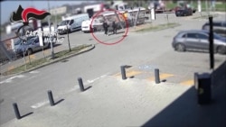 Shopping mall cameras record Vladimir Jovancic speaking with Srdjan Lolic