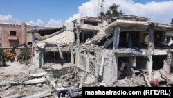 Два взрыва в помещении отдела полиции по борьбе с терроризмом в городе Кабале в пакистанской провинции Хайбер-Пахтунхва унесли в апреле жизни нескольких силовиков, здание обрушилось. Автор: Ниаз Ахмад Хан, пакистанская редакция «Азаттыка».