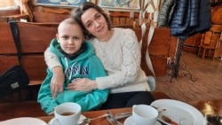 'Hard And Painful': Displaced By War, Ukrainian Boy Continues Cancer Treatment In Prague
