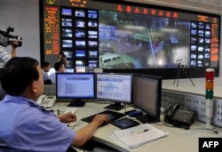 Үрүмчүдөгү. Полициянын шаардагы көчөлөргө байкоо жүргүзүү бөлүмү. 2010-жыл