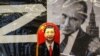 Русская матрёшка с портретом главы Китая на фоне символов российской агрессии (архивное фото, март 2023)