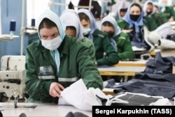 Women convicts make clothing inside a prison in the Moscow region in March 2022.