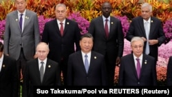 Бээжиндеги форумдун катышуучулары.