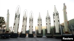 Iranian ballistic missiles are displayed during a ceremony in Tehran in August 2023.