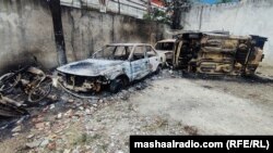 پولیس وايي بلوه ګرو په تاڼه کې یوشمېر ګاډي وسوځول - د جون ۲۱مې انځور.