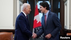 Байден жана Трюдо.