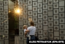 A memorial for the victims of executions and attacks on individual civilians by Russian troops in Bucha.