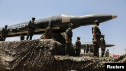 The Houthis publicly display their ballistic missiles during a military parade in Sanaa, Yemen, in September 2023. 