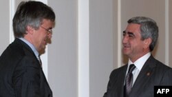 President Serzh Sarkisian (right) greets EU envoy Peter Semneby in Yerevan.