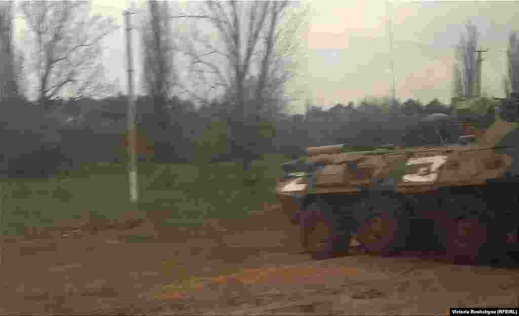 A Russian armored personnel carrier near one of the villages in the occupied Kherson region. "A lot of vehicles are coming in from Crimea. Every night, we hear them move," one local resident said. "When our troops start a counterattack, it will be hot."