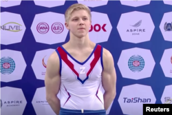 Sportisti Ivan Kuliak duke promovuar simbolin 'Z'.