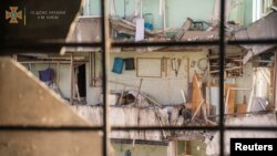 Наслідки обстрілу житлового будинку в Києві, 16 березня 2022 року