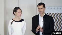 بشار اسد، رئیس جمهوری سوریه به همراه همسرش اسما اسد