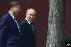 Xi și Putin la Beijing, marți, 2 septembre 2025.