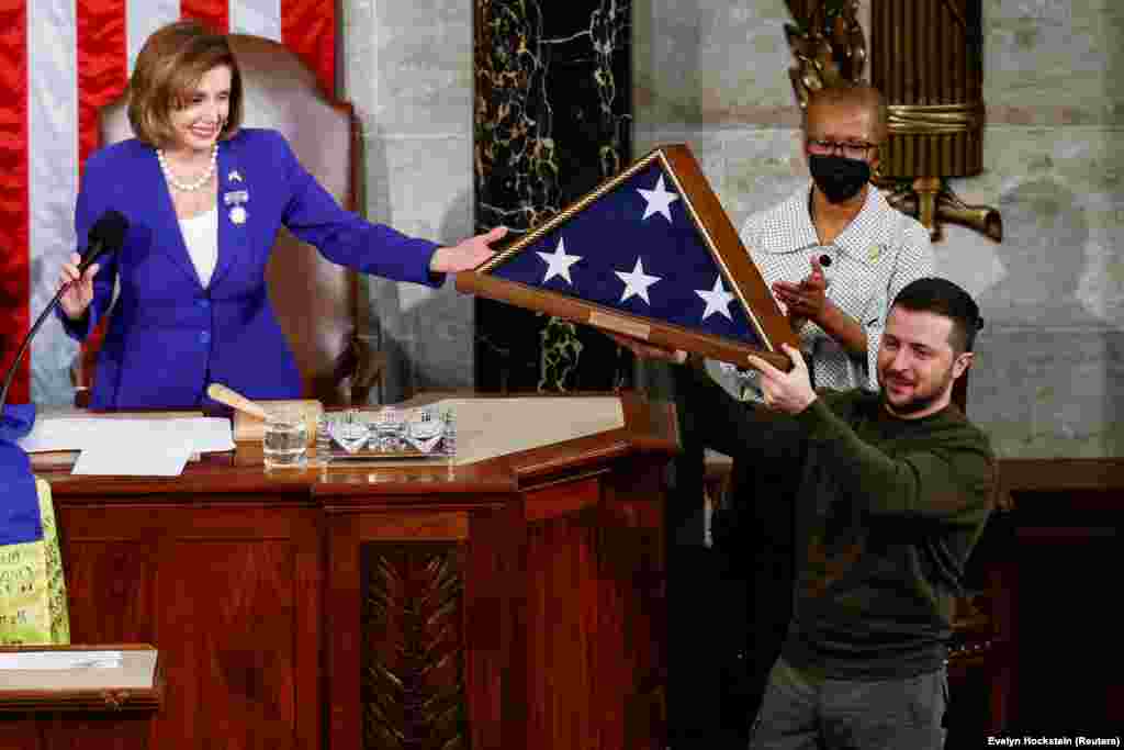 A U.S. flag that had flown over the Capitol building earlier in the day in his honor is presented to Zelenskiy by Pelosi. Zelenskiy concluded his speech with: "Thank you so much, may God protect our brave troops and citizens, may God forever bless the United States of America. Merry Christmas and a happy, victorious New Year.&nbsp;Slava Ukrayini!" (Glory to Ukraine!).