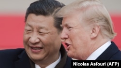 Китайський президент Сі Цзіньпін (ліворуч) та президент США Дональд Трамп (архівне фото)