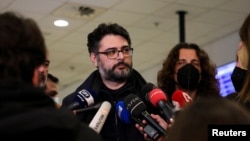 Маноліс Андрулякіс пасьля вяртаньня ў Грэцыю, фота Reuters