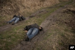 ბუჩაში დახოცილი მშვიდობიანი მოქალაქეების ცხედრები, 2022 წლის 4 აპრილი.