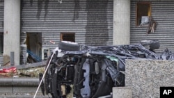 Ослодогу жардыруу маалында 7 киши өлүп, бир автоунаа ойрон болду. AP. 22.7.2011.