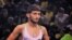 Iranian wrestler Mohammad Namjoomotlagh is the latest athlete to seek refuge in the West after failing afoul of the clerical establishment.