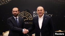 Turkey - Foreign Ministers Mevlut Cavusoglu of Turkey and Ararat Mirzoyan of Armenia meet in Antalya, March 12, 2022