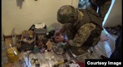 Задержание подозреваемых в городе Кызыл-Кие, фото ГКНБ.