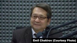 Исирадин Аманбаев.