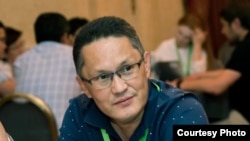 Айбар Султангазиев.