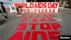 СПИДге каршы күрөш күнүнүн Индияда  белгилениши. Колката шаары, Индия. 30-ноябрь, 2017-жыл. 