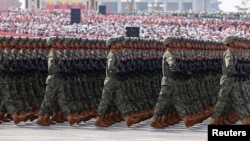 Personalul Forțelor Aerospatiale Chineze (ASF) defilează la parada militară organizată cu ocazia împlinirii a 80 de ani de la sfârșitul celui de-al Doilea Război Mondial. Beijing, 3 septembrie 2025.