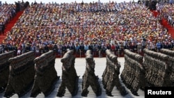ჩინეთის სახალხო-გამათავისუფლებელი არმიის (PLA) ჯარისკაცები მონაწილეობენ სამხედრო აღლუმში. 2015 წლის 3 სექტემბერი