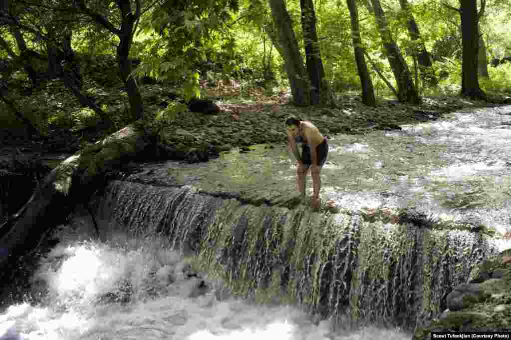 Tufankjian also traveled to Nagorno-Karabakh, the predominantly ethnic Armenian region located within the territory of Azerbaijan. Here, an Armenian refugee from Syria relaxes in the Karabakh town of Kovsakan. &nbsp;