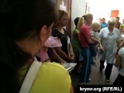 Qurman rayon hastahanesiniñ bala poliklinikasındaki nevbet. Arhiv fotosı