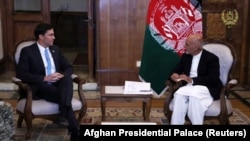 FILE: Afghan President Ashraf Ghani with the U.S. Defense Secretary Mark Esper in Kabul, October 2019.