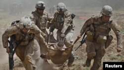 File photo of combat in Helmand.