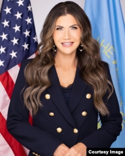 Кристи Ноэм.